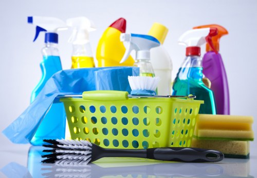 Cleaning staff applying safe working practices during a professional cleaning job